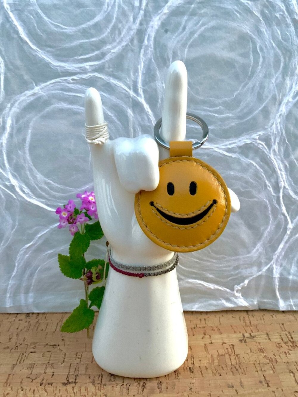 Barneys New York Smiley Face leather keychain
